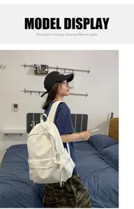 Zaino in tela casual con stampa di stelle, borsa leggera per viaggi e uso quotidiano.