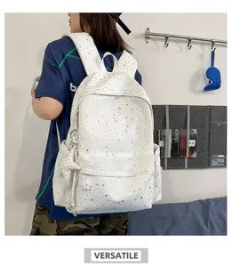 Zaino bianco elegante con stampa di stelle per tempo libero, scuola e viaggi.