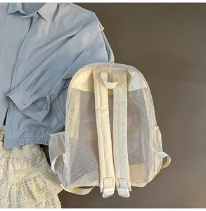 Sac à dos en résille beige tendance, grande capacité, cartable d'étudiant respirant pour l'usage.