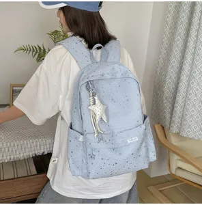 Zaino azzurro con stampa di stelle borsa casual carina per scuola viaggio uso quotidiano