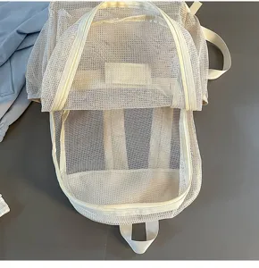 Vue detaillee de sac a dos en maille blanche, cartable respirant a double fermeture eclair