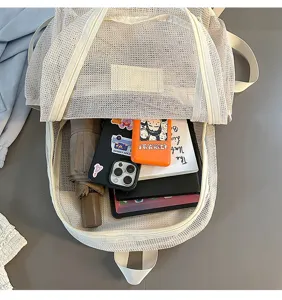 Sac à dos étudiant en filet grand et décontracté vue intérieure montrant un espace de rangement.