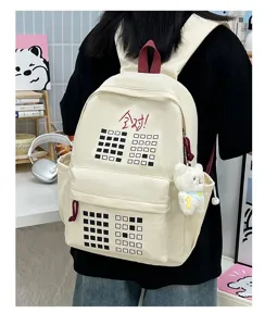 Cream canvas student backpack with cute grid pattern and large capacity school bag.