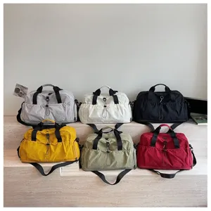 Large capacity travel duffel bag, casual sports gym bag with shoulder strap and multiple colors.