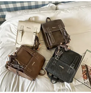 Stylish large capacity PU leather backpack set with cute animal charms casual use.