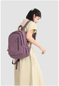 Lightweight casual purple backpack for women, waterproof commuter bookbag for travel.