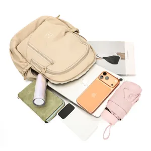 Lightweight travel backpack for women, waterproof casual daypack with large capacity for laptop.