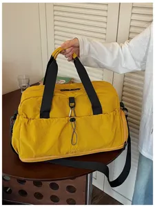Large capacity yellow travel duffel bag, casual gym sports bag with adjustable shoulder strap.