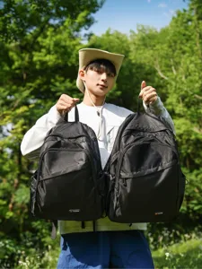Lightweight mountaineering backpack for outdoor travel, durable black daypack daily use