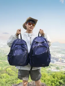Lightweight mountaineering backpack for outdoor hiking, casual blue couple dual-shoulder bag.