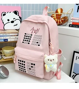 Pink canvas school backpack for students, cute bear pendant, large capacity travel bag.