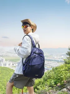 Lightweight outdoor mountaineering backpack for travel and daily commute with large capacity.