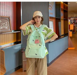 Casual canvas backpack for students, cute embroidery design, lightweight daily school bag.