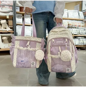 Lindo juego de mochila y bolso de hombro ita japonés con lunares y ventana de malla frontal.
