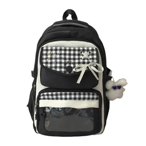 Black and white plaid student backpack with bow, transparent front pocket and cute plush pendant.