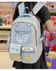 Kawaii cute JK school backpack with transparent ita window, pastel blue and white design.