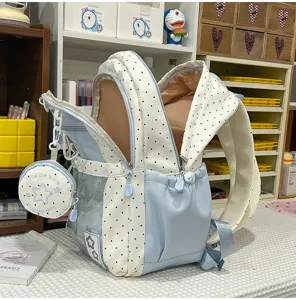 Vista detallada de mochila escolar de lunares estilo japonés lindo, bolso grande con bolsito.
