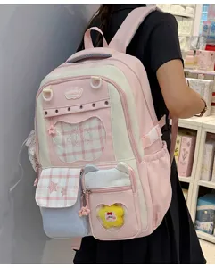Cute pink Japanese style school backpack for girls, sweet multi-pocket design with clear window.