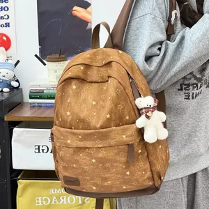 Korean style large capacity star pattern school backpack for students, casual travel daypack.