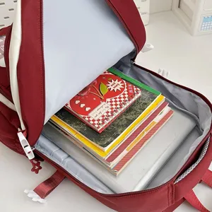 Large capacity casual school backpack for students, stylish travel daypack with multiple pockets.