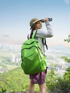 Vibrant green lightweight mountaineering backpack, ideal for outdoor travel, daily commute.