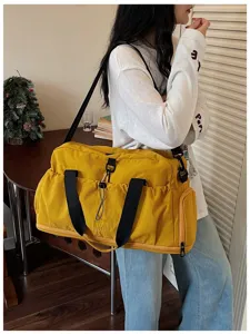 Large capacity travel duffel bag with shoulder strap for gym, sports and weekend trips.