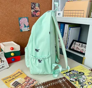 Mint green cute student school bag with small embroidery, lightweight casual daily backpack.