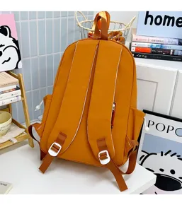 Casual mustard yellow backpack with white adjustable buckles and side pockets for students.