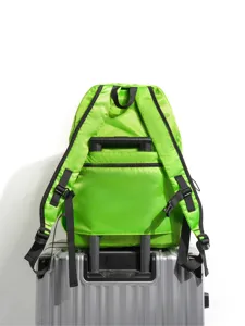 Lightweight vibrant green folding backpack detail, ideal for outdoor travel, hiking and daily use.