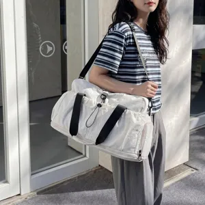 Large capacity travel duffel bag for gym, sports and outdoor weekend trips with shoulder strap.