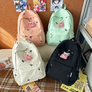 Cute cartoon embroidered student backpack versatile multi-color casual school bag.