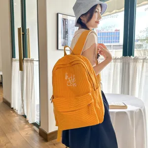 Lightweight bubble texture warm yellow plaid student backpack for daily school and outdoor trips.