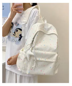 Dreamy aesthetic star print backpack for women, cute school bag for student daily casual use.