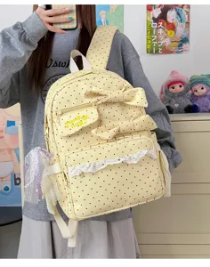 Cute sweet style yellow polka dot backpack with double bows and lace for daily use