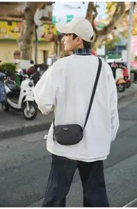 Outdoor small crossbody bag for men casual sports shoulder phone bag stylish commuter bag.