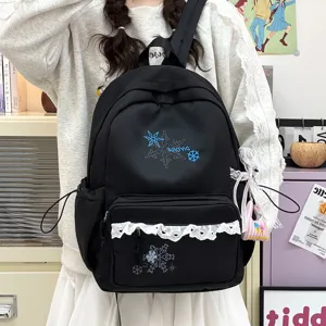 Cute black canvas school backpack with snowflake embroidery and white lace trim for daily student use.