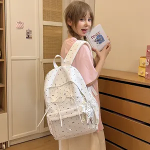 Sweet Korean style white backpack with cute bows and dots for students and daily wear.