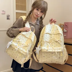 Cute polka dot student backpack with bow and clear front pocket, sweet daily casual school bag.