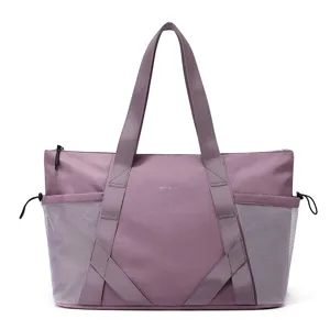 Große mauvefarbene Yogatasche für Damen, lässige Reisetasche mit Netztaschen an der Seite.