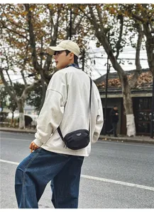 Outdoor casual crossbody bag for men and women, stylish sports commuter shoulder phone bag.