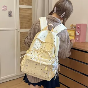 Sweet Japanese style polka dot bow detail backpack close-up view for daily casual use.