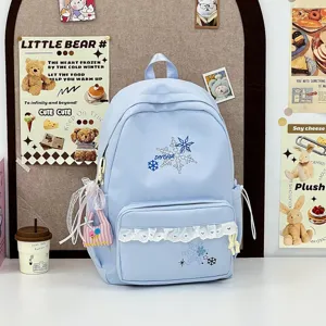 Cute light blue school backpack with lace trim, sweet bow, snowflake embroidery, large capacity campus bag.