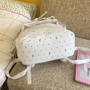 Cute white polka dot bow backpack with clear front pocket casual student school bag stylish