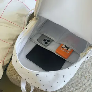 White polka dot bow student backpack internal detail view large capacity daily casual casual bag