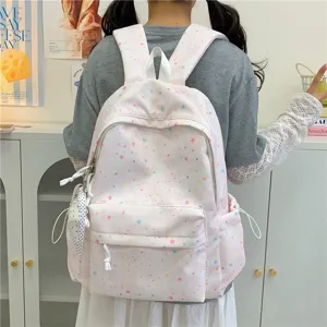 Pink star print school backpack for women, cute aesthetic casual daypack with multiple pockets.