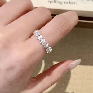 Delicate silver star ring for women, minimalist open finger ring, elegant jewelry piece.
