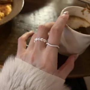 Minimalist star and wave stackable rings set, stylish open finger jewelry for women.