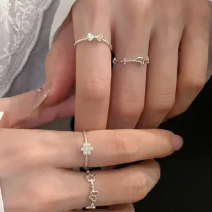 Silver stackable rings set featuring cute butterfly and moon designs, trendy index finger jewelry.