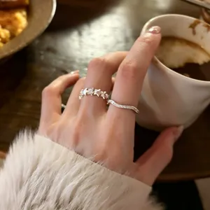 Chic star and wave stacking rings for women, minimalist geometric open finger jewelry showcase.