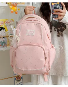 Pink star print backpack with lace trim, cute school bookbag for daily travel and student use.